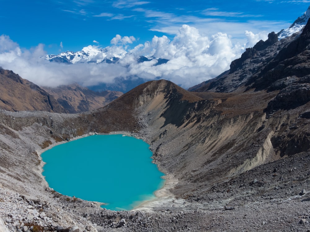 body of water near mountain