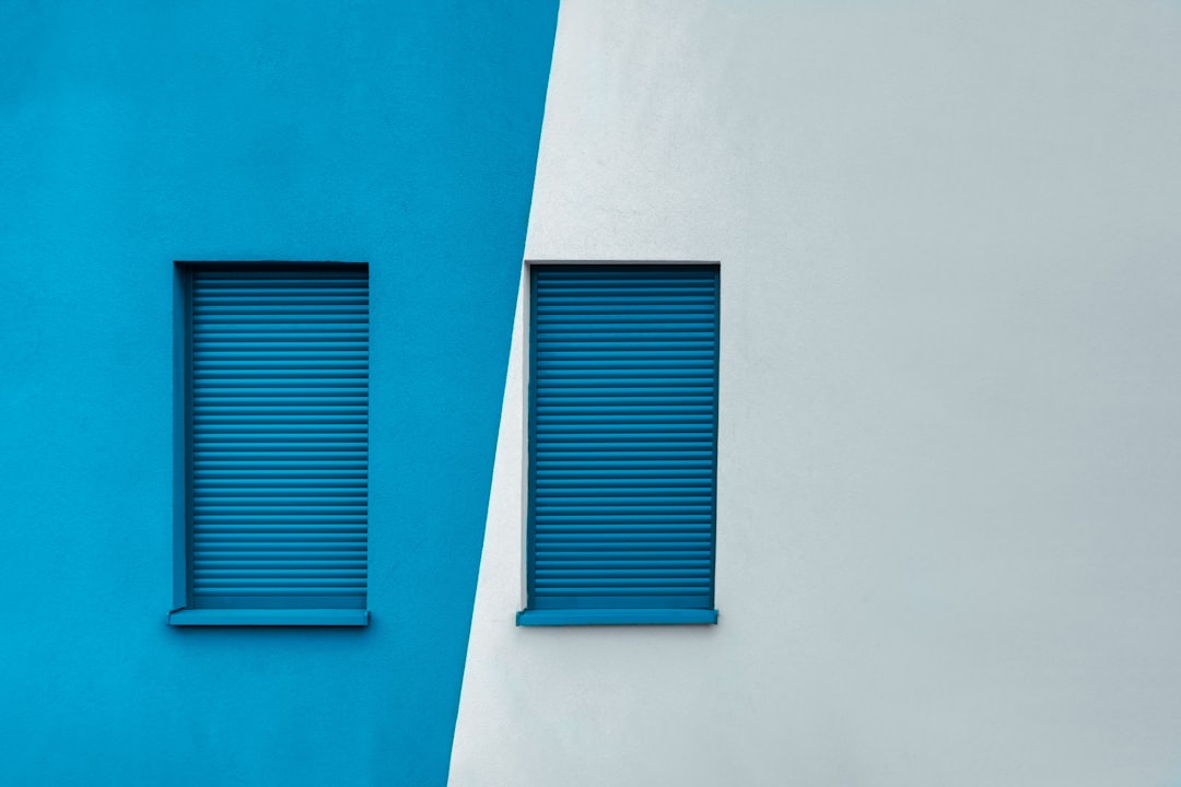 blue wooden window frames