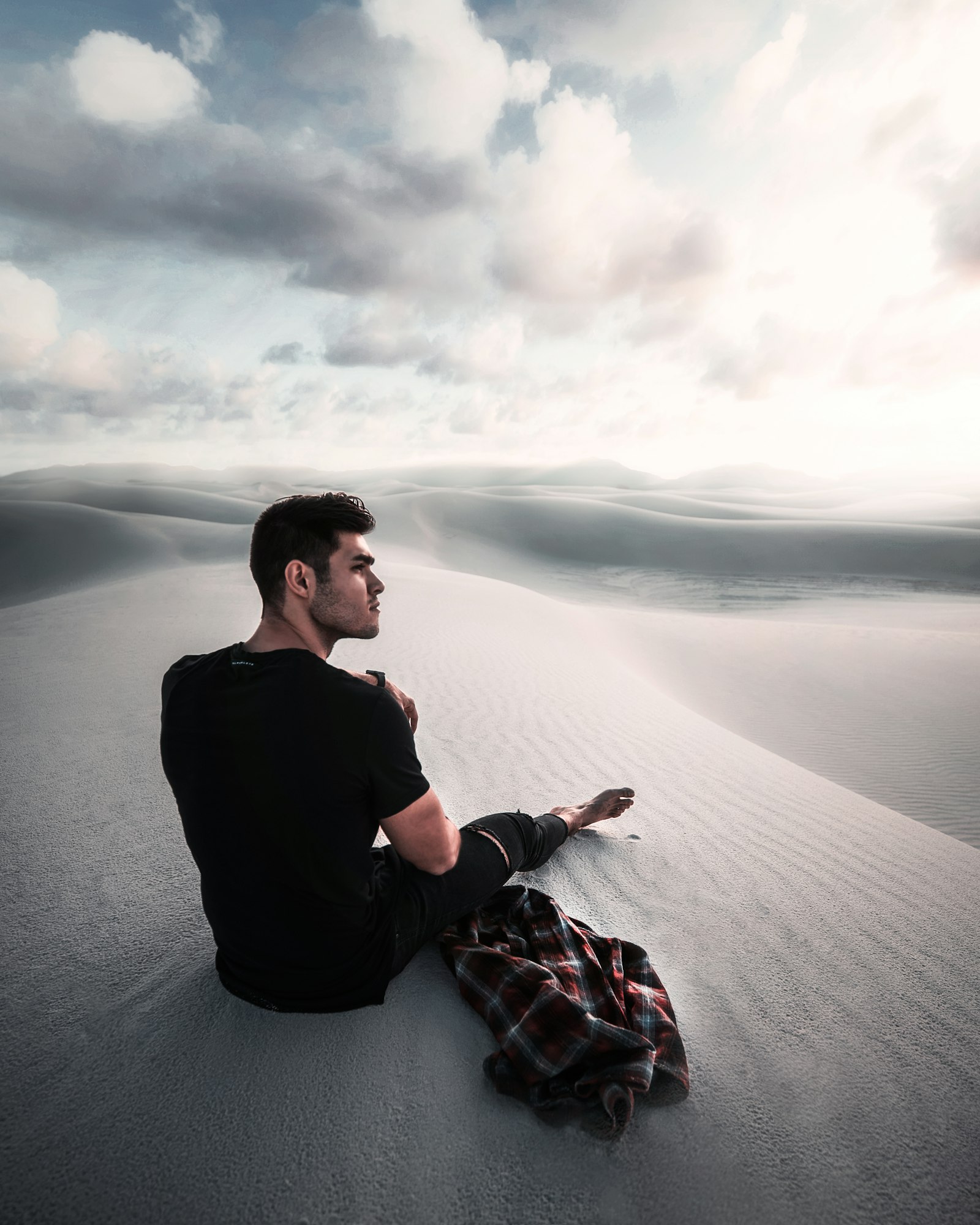 Canon EF 16-35mm F2.8L III USM sample photo. Man sitting on gray photography