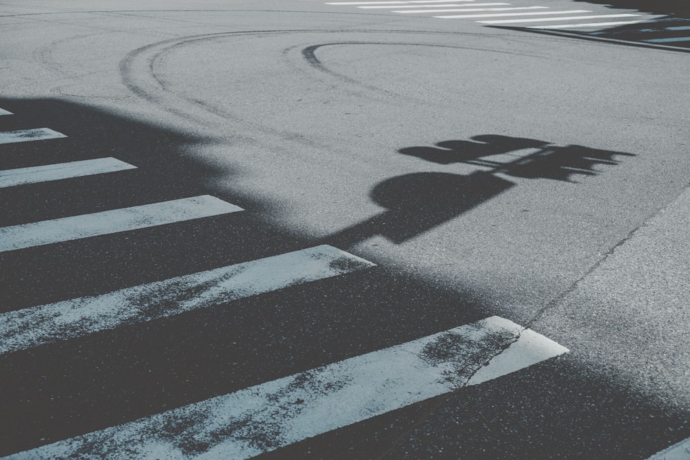 traffic light's shadow on road