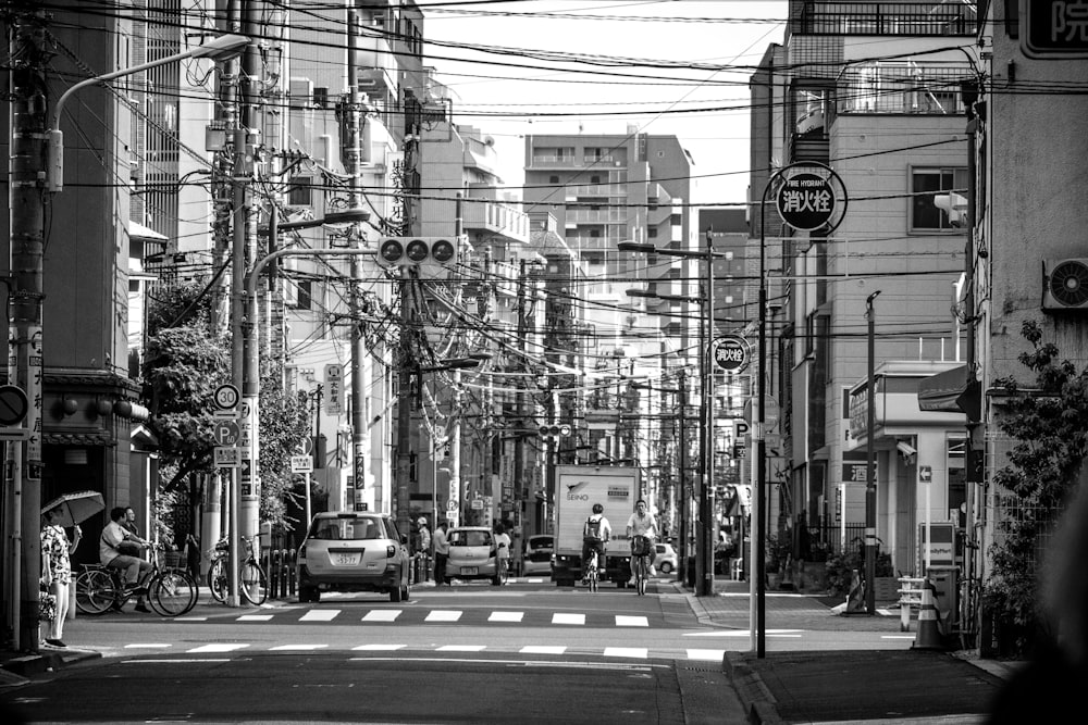 grayscale photo of buildings and street