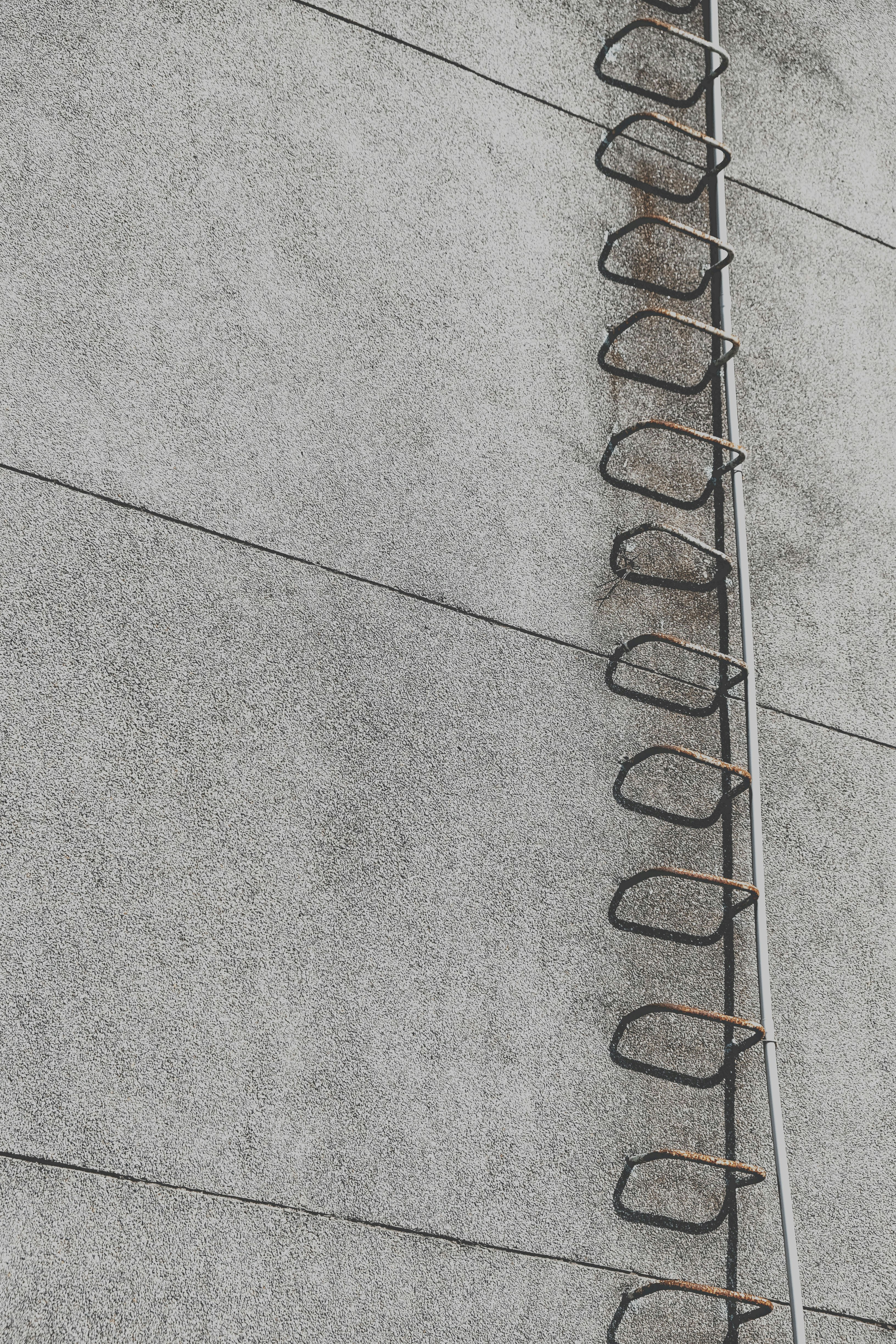 A board-formed concrete elevation in raking light