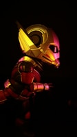 Close-up of a colorful game character with detailed armor and glowing effects.