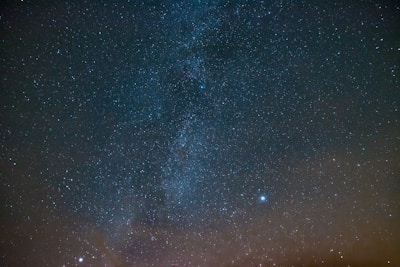 A mystical night sky filled with constellations and glowing numbers interwoven.