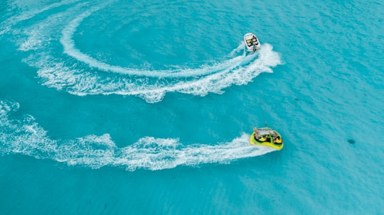 people riding towable tube in Fulidhoo Maldives