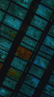 A calm blue and dark teal abstract pattern reflecting the kestrel quest brand colors.