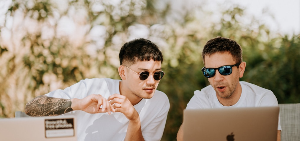 two men using MacBooks by Annie Spratt (https://unsplash.com/@anniespratt)