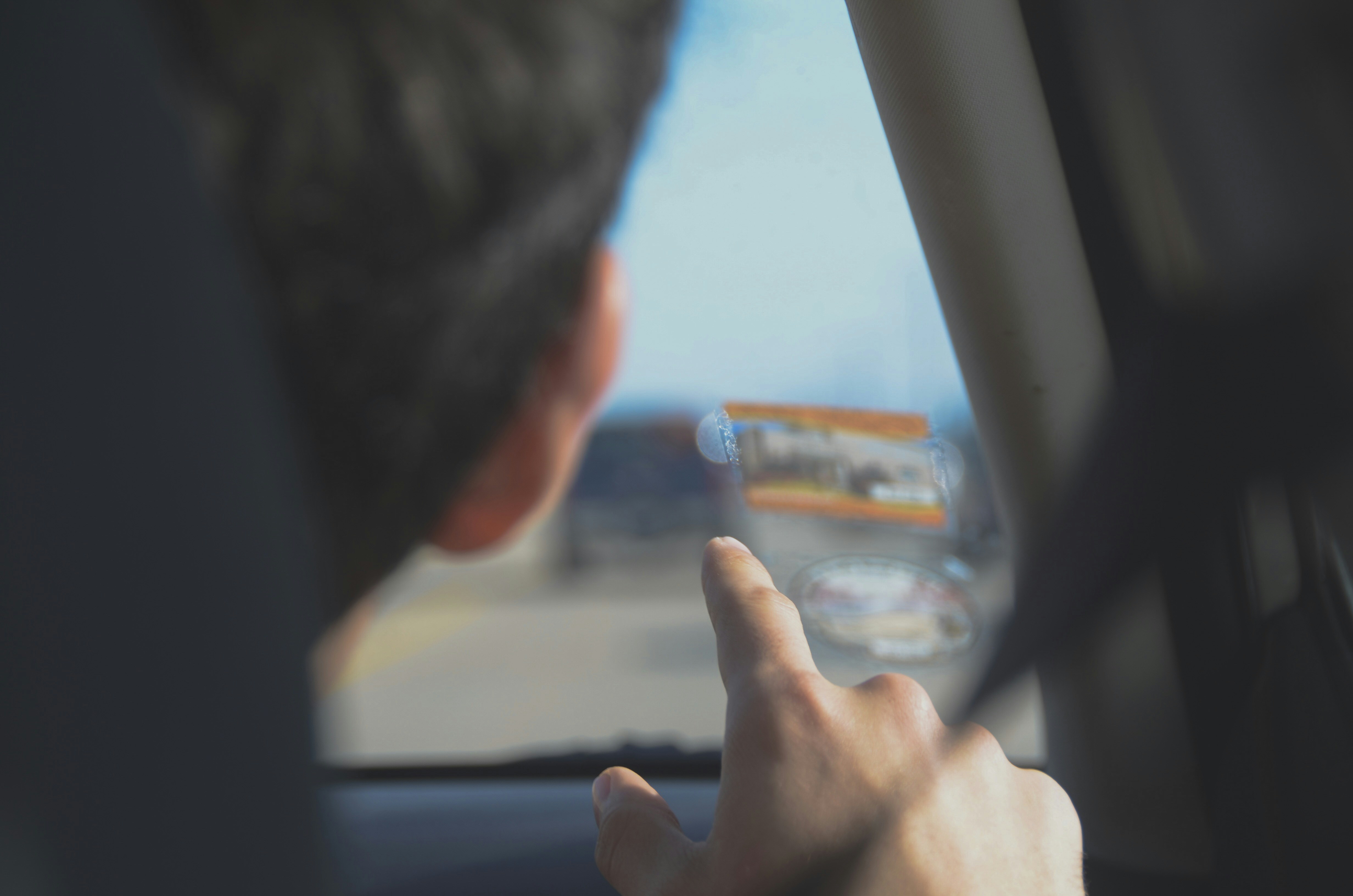 of a driver looking at a phone instead of the road - crosswalk accident attorney