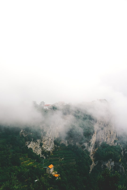 mountain with fog above in Furore Italy