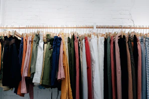 Brightly colored plus-size pants displayed on a modern hanger