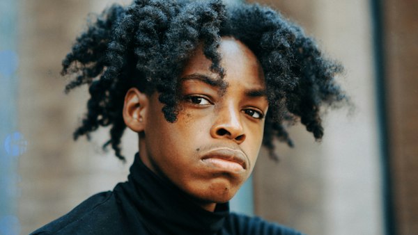 Man with natural coily hair