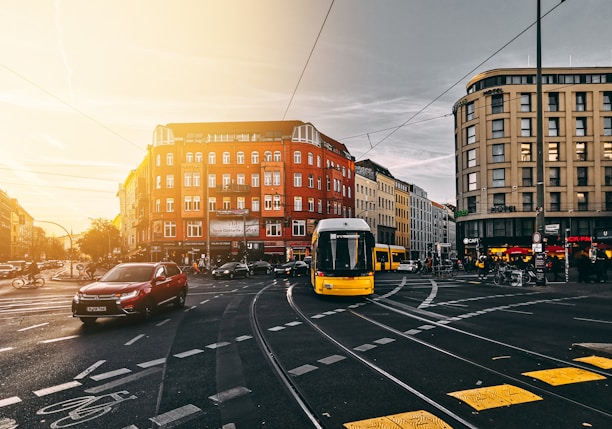 bus and cars on road