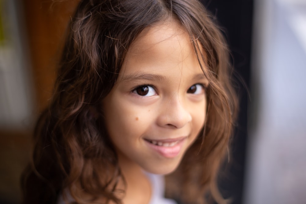 selective focus photo of smiling girl