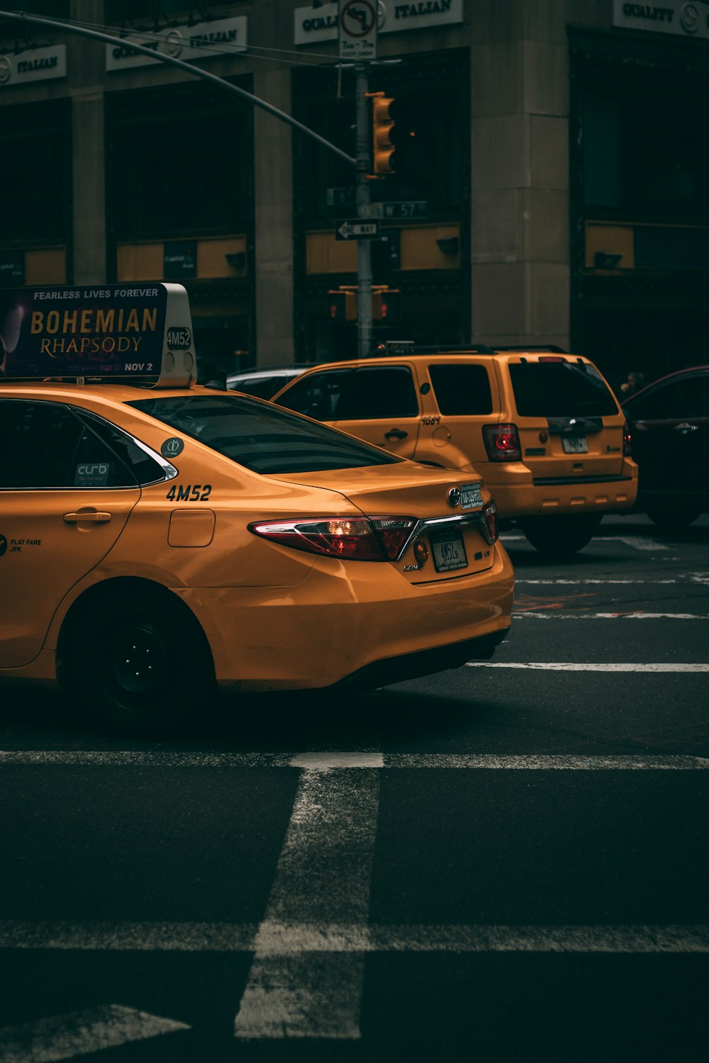 orange cars on road