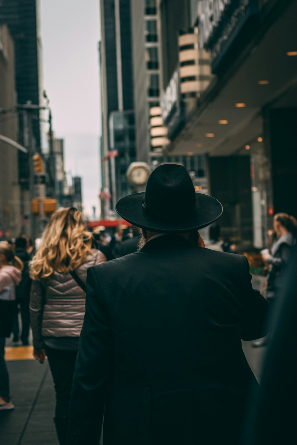 man walking on pathway