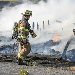 firefighter watching of burning plank