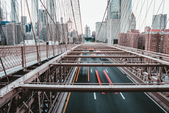 gray metal hanging bridge in Brooklyn Bridge Park United States