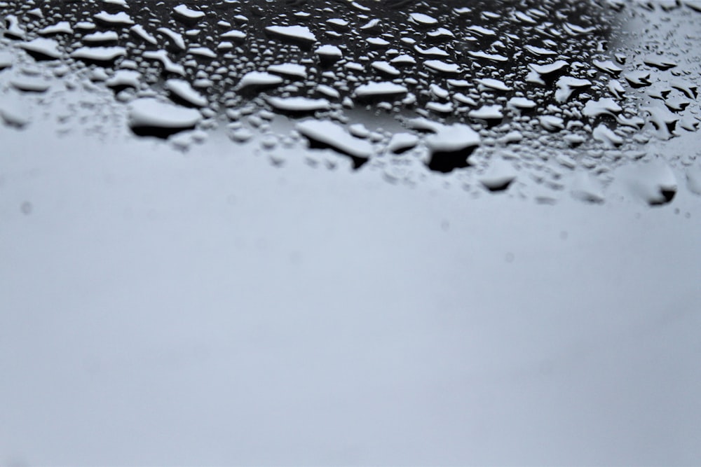 rain drops on the windshield of a car