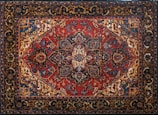 An ornate Persian rug showcasing rich reds and intricate designs.