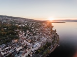 aerial photography of buildings beside sea