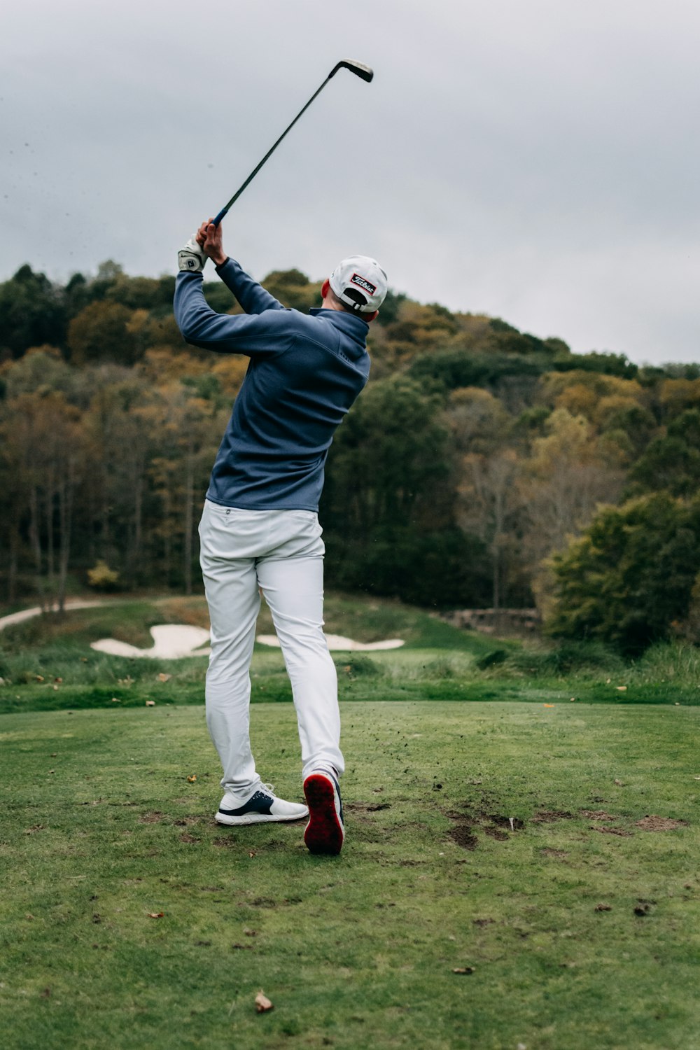 person playing golf during daytime