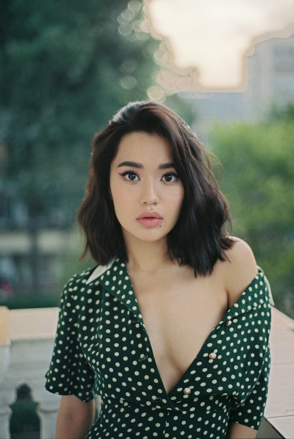 woman wearing black and white V-neck top