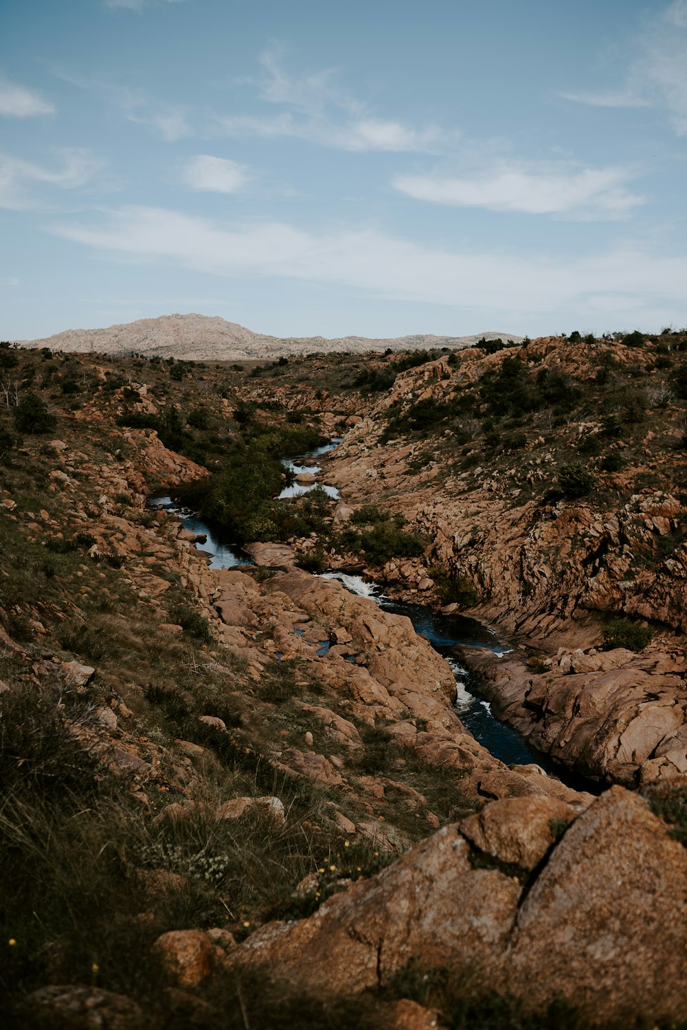 body of water surrounded by stones