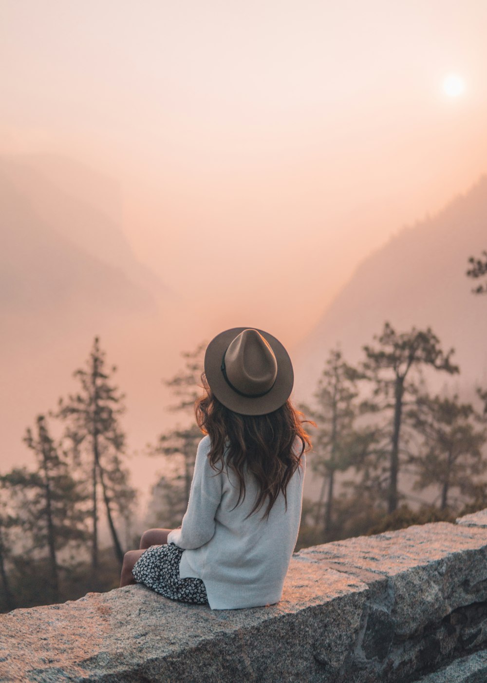 woman wearing gray hat