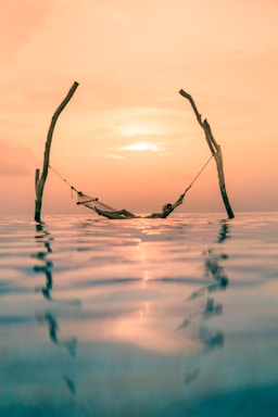 balance and symmetry for photo composition,how to photograph @drewcolins; person on hammock