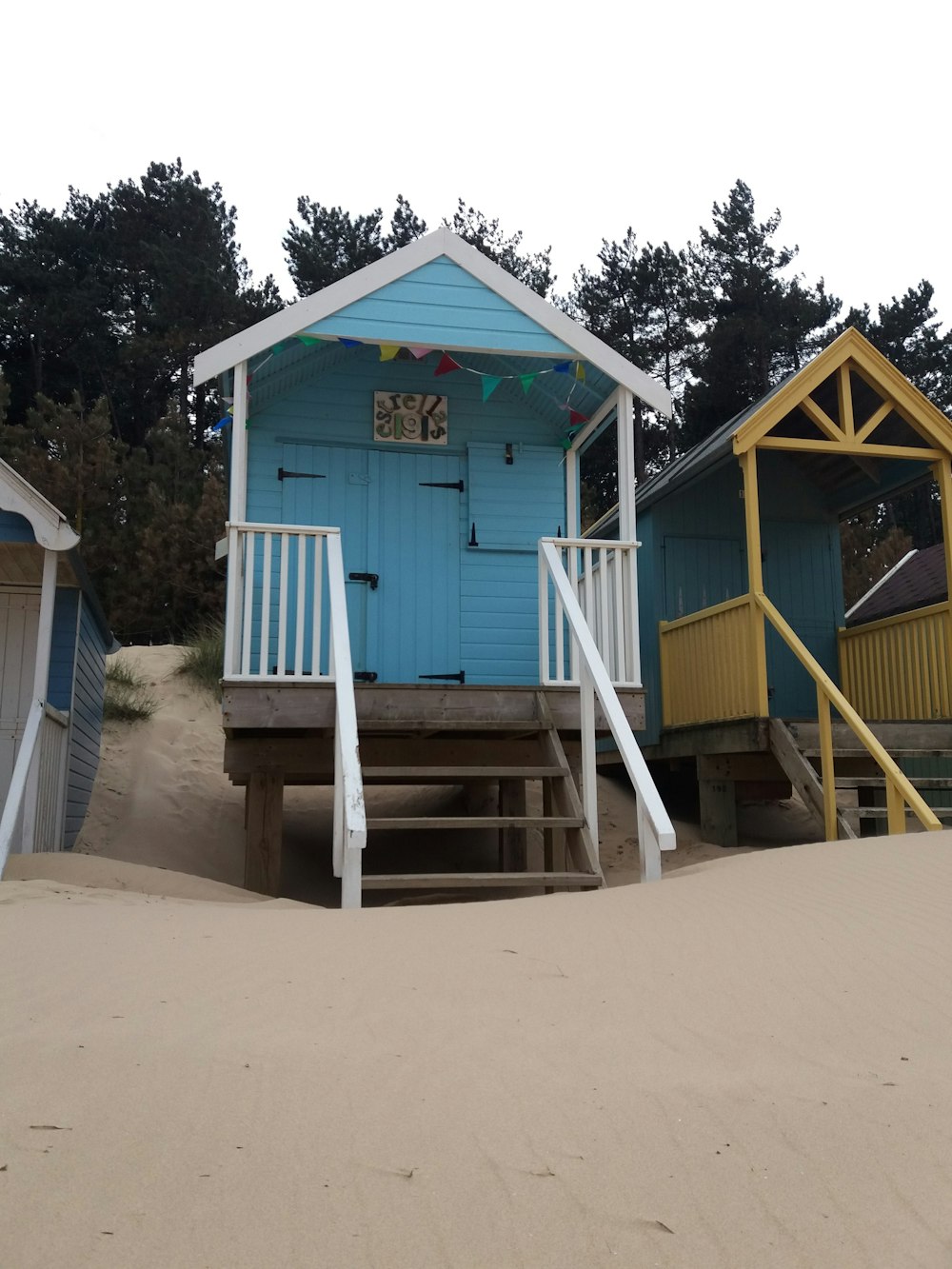 white and blue wooden house