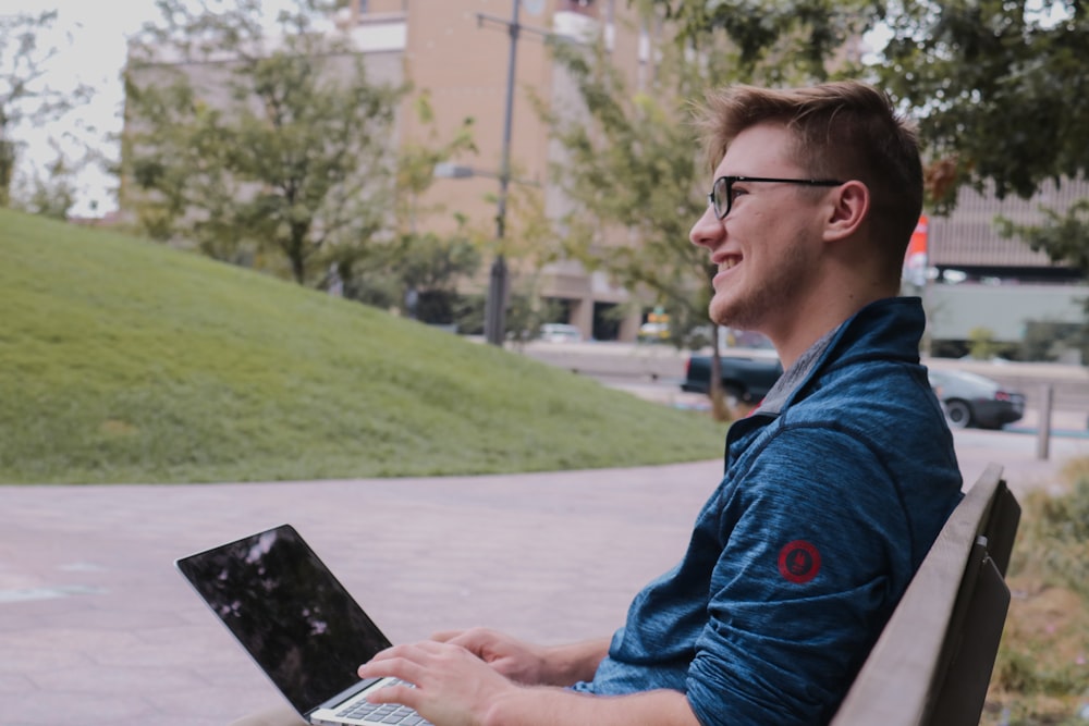 man using laptop computer