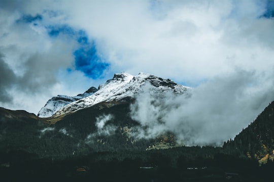 glacier mountain covered with clouds during daytime in Interlaken Switzerland