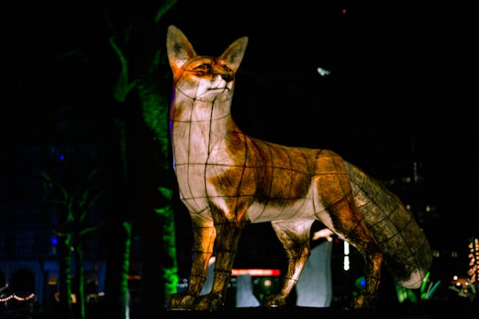 brown fox statue in Leicester Square United Kingdom