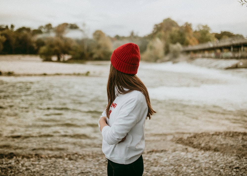 woman wearing white sweatshirt