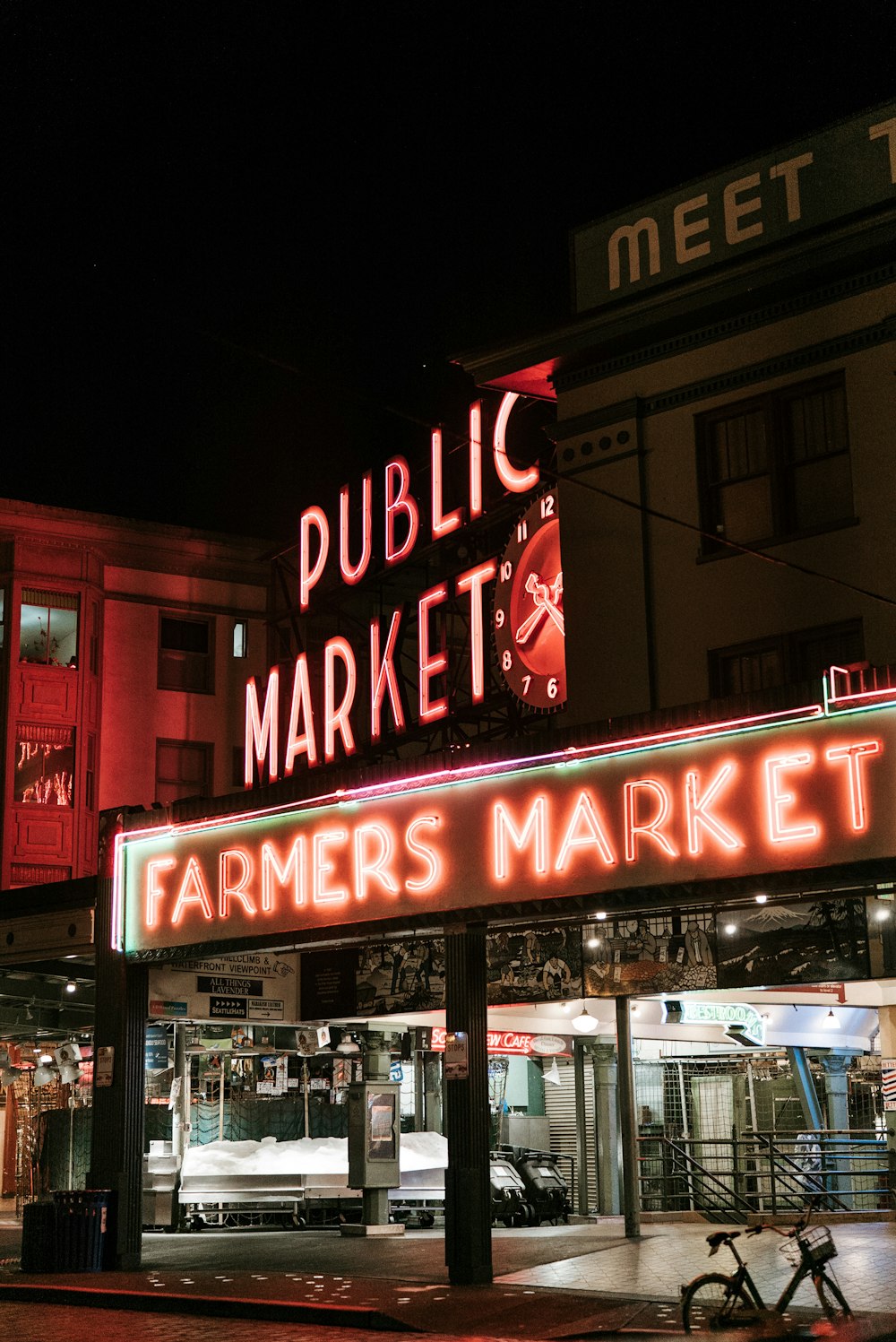 powered-on public market farmers market neon signage