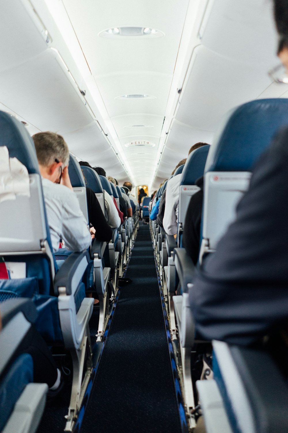 people sitting inside plane