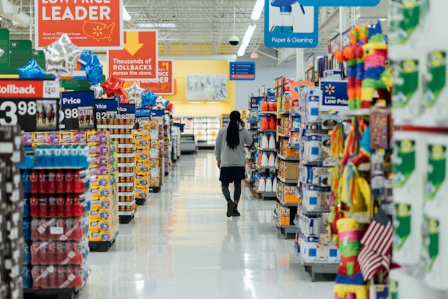 A shopper alone in a grocery aisle