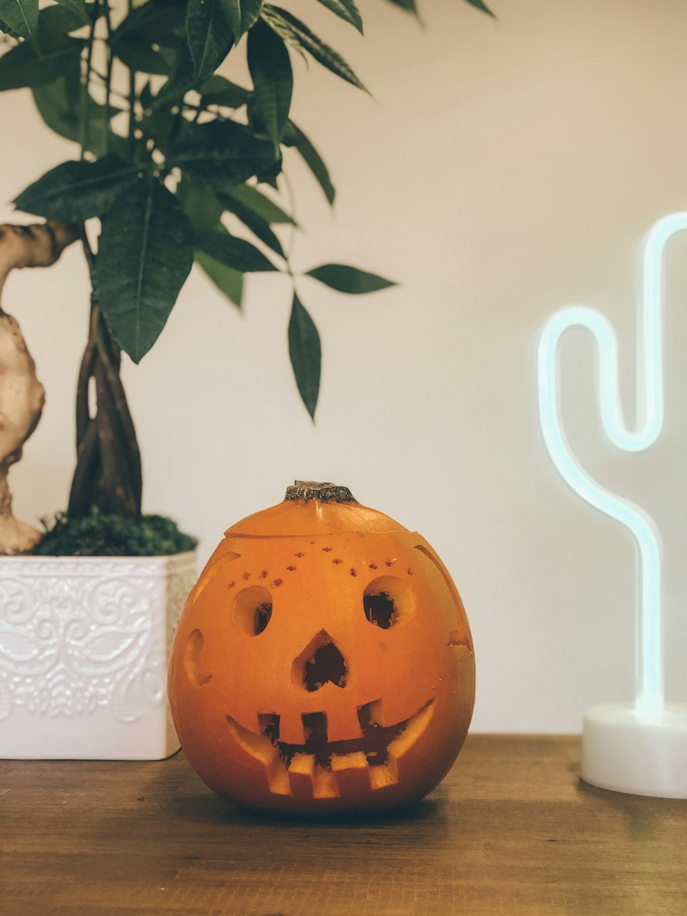 orange pumpkin head on the table