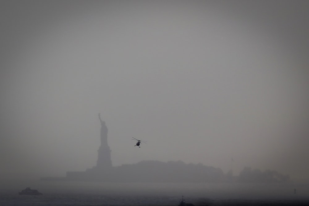 helicopter near Statue of Liberty at New York City