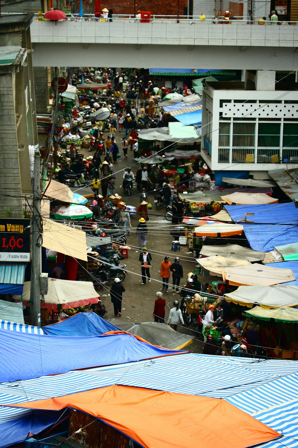 group of people standing on the street