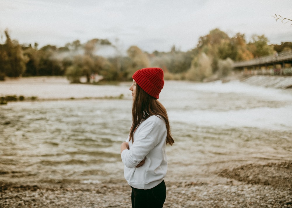 woman wearing white sweater