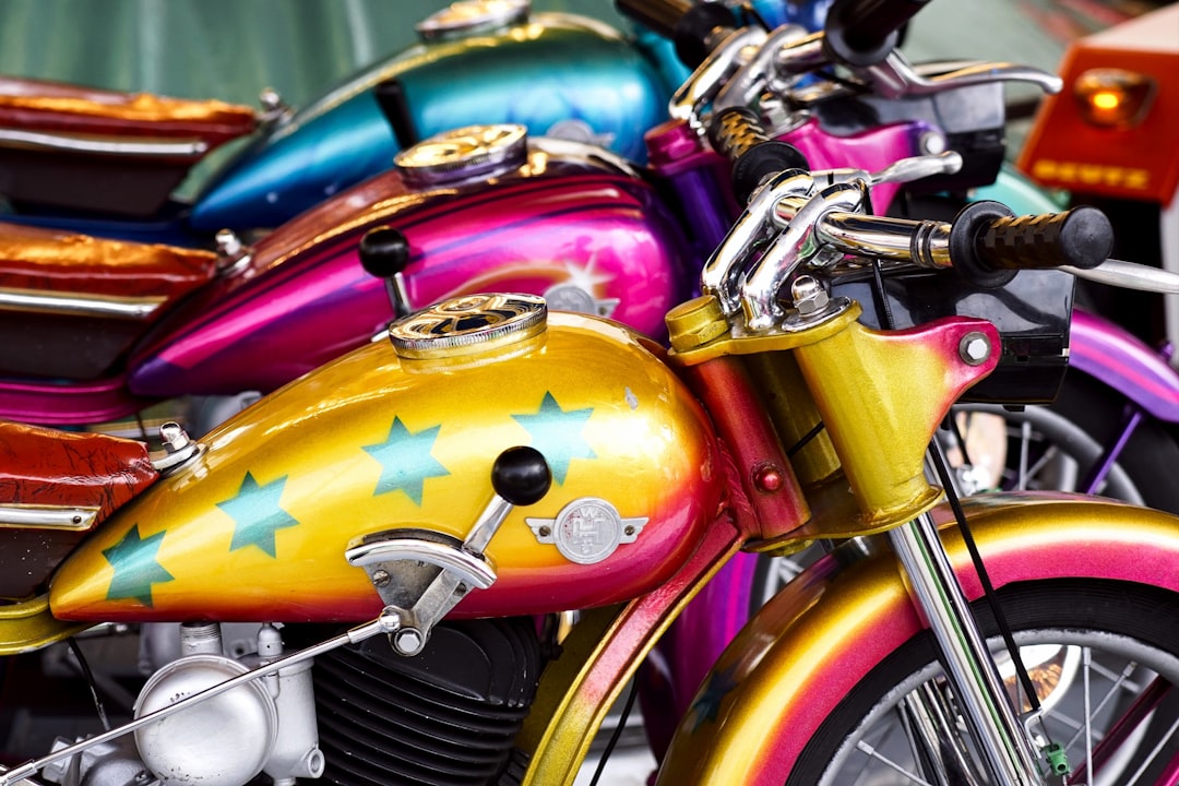 selective focus photography of parked three cruiser motorcycles
