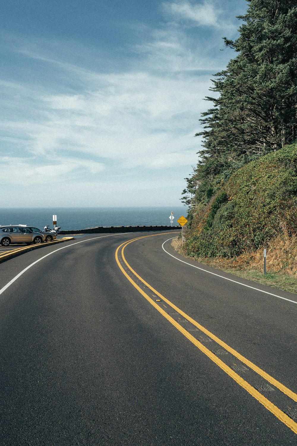 gray coupe near road