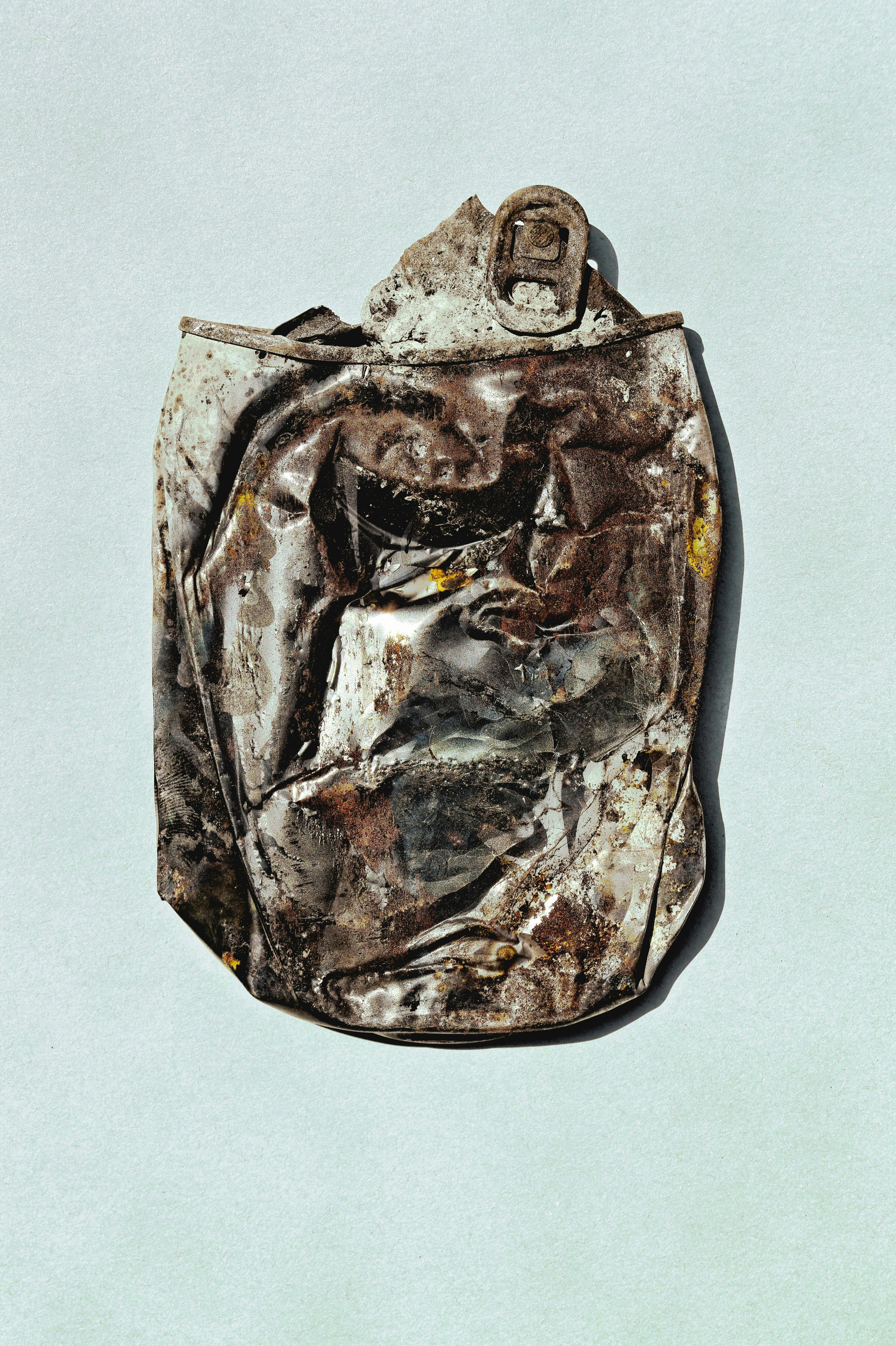 gray leather bag on gray surface