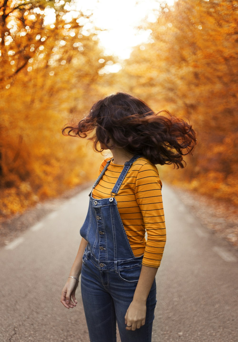 woman wearing blue overalls