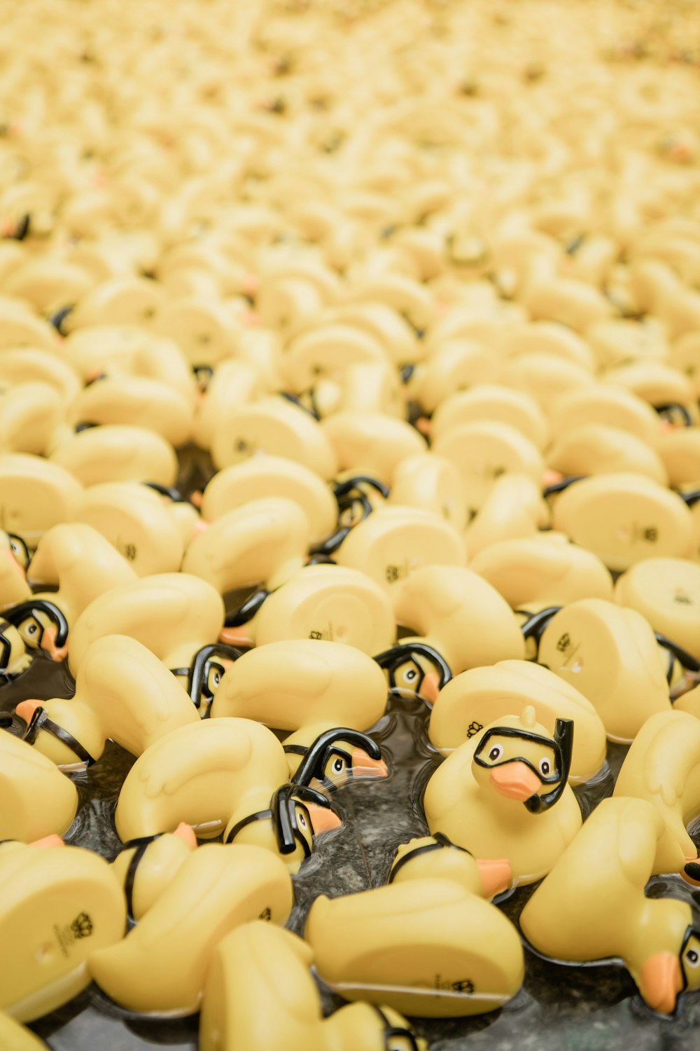 a bunch of rubber ducks sitting on top of a table
