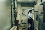 man standing near the control panel