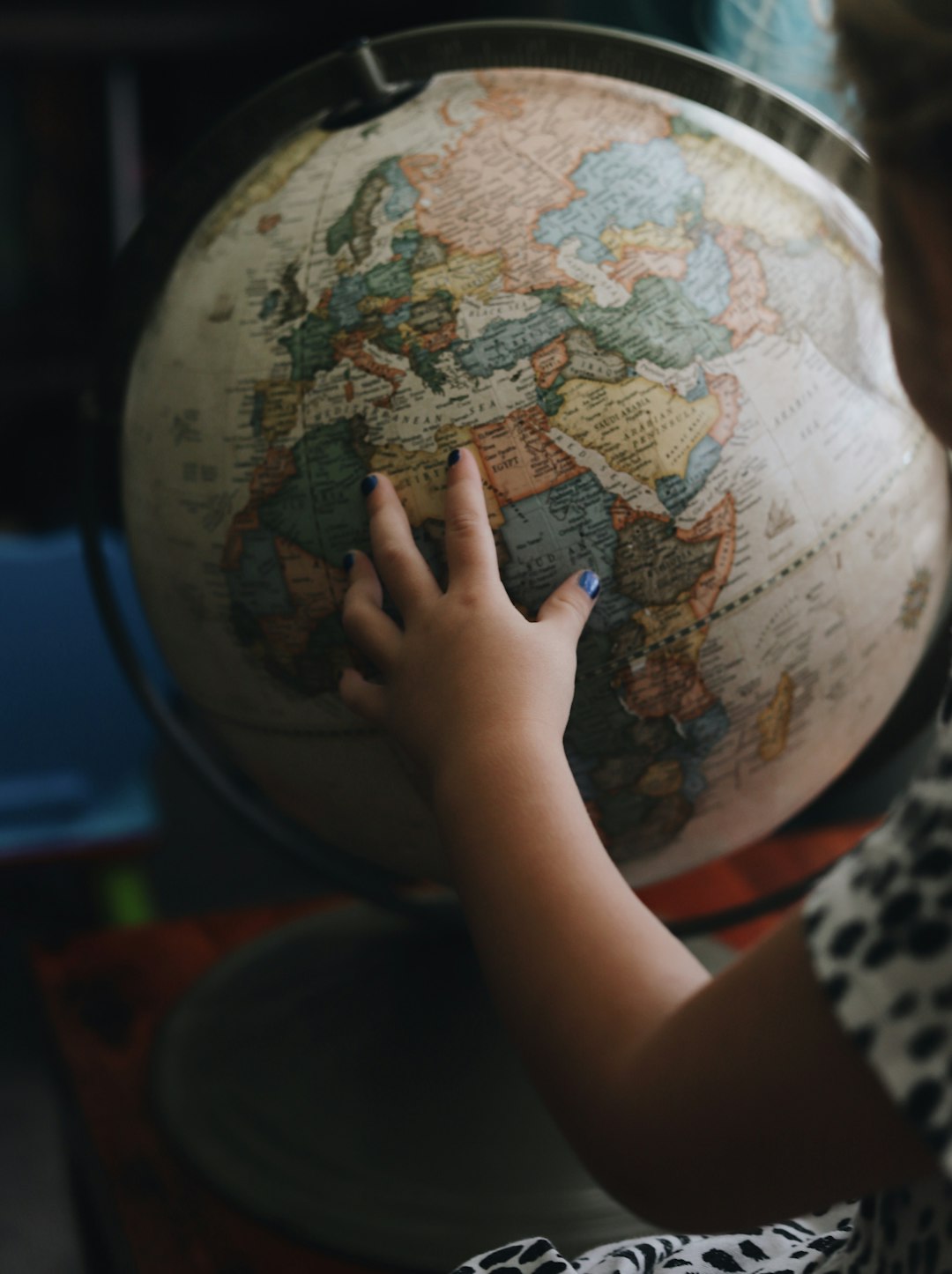 white and beige desk globe