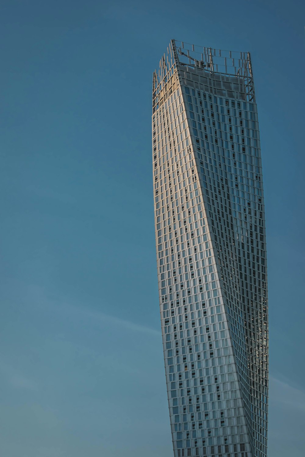 curtain wall high-rise building during daytime