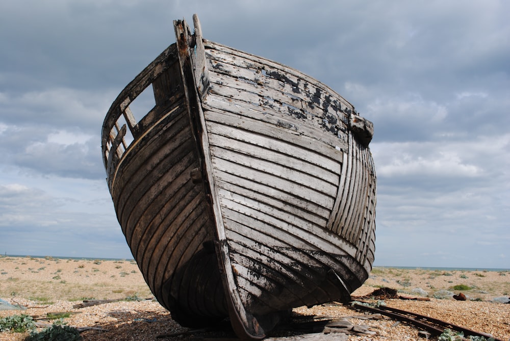 wreck brown boat on sand